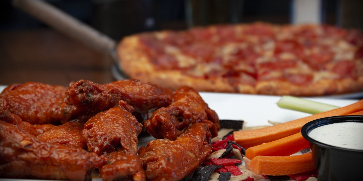 $29.99 for Tailgater's TouchDown Buffet at Pizza Man (39% discount) - Partner Offer Image